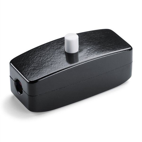 Valaisinkytkin, musta bakeliitti valkoisella napilla.